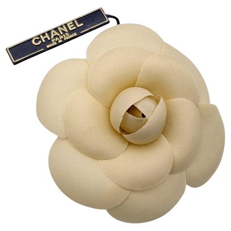 chanel camellia brooch cosmic|Chanel vintage brooch.